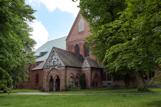 istock Narthex called paradise at the Luebeck cathedral built with open arcades in brick architecture, idyllically situated between old trees 1248298057