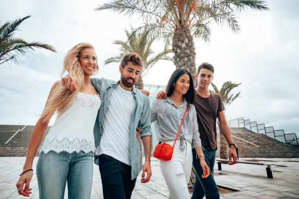 istock friends walking together in barcelona 1248298156