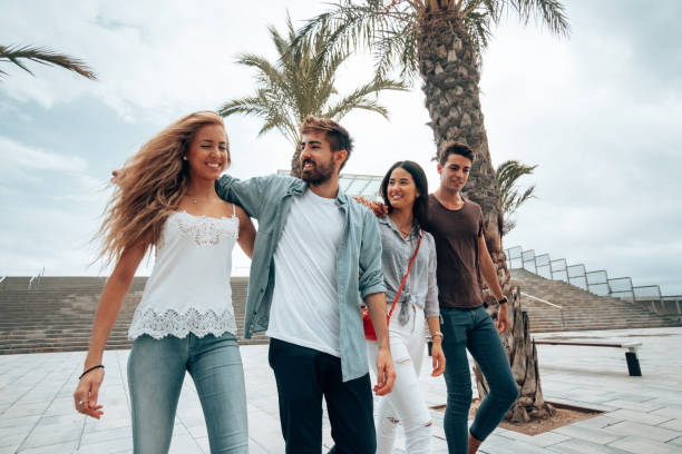 istock friends walking together in barcelona 1248298330