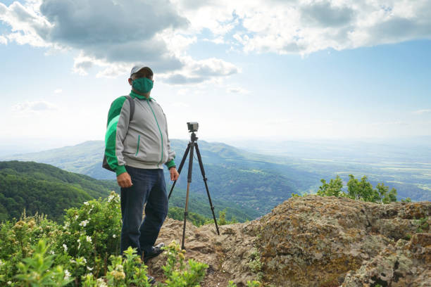 istock A Man With a Mask Taking Picture 1248298471