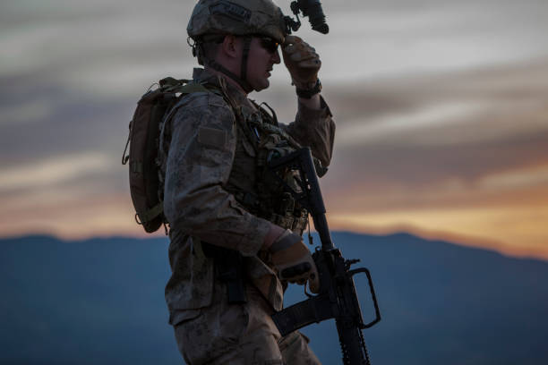 istock Silhouette of Army Soldier at sunset 1248302205