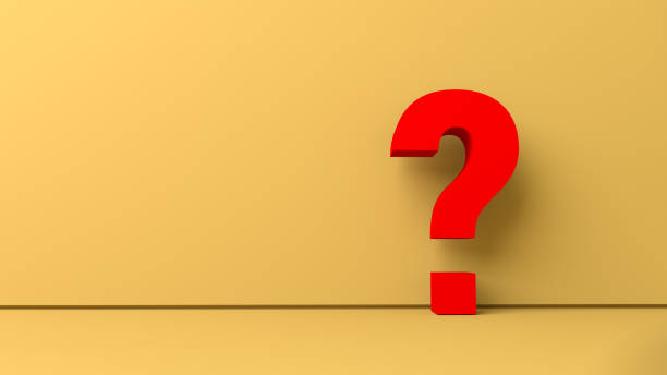 istock Red question mark on a yellow background wall and floor 1248310303