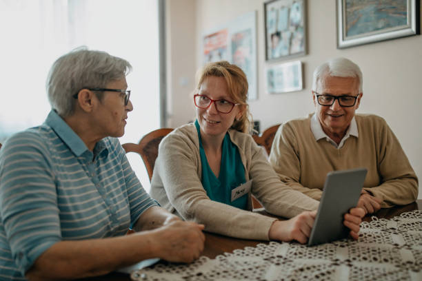 istock Nurse visiting senior man and woman 1248310338