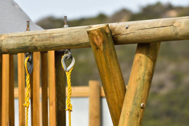 istock Wooden Swing Frame Structure In Playground 1248316369