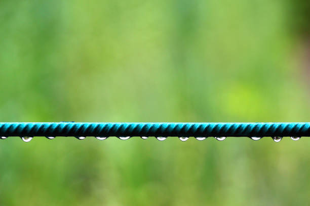 Water drops on wet iron rebar after rain