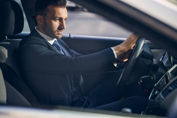 istock Young Caucasian male staying in car alone 1248319777