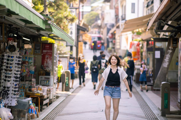 istock Young woman visiting old town 1248322751