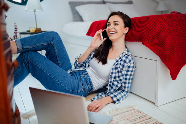 istock Cheerful young female working from home 1248325138