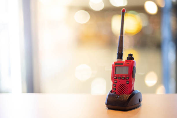 A red Walkie Talkie or Portable radio transceiver for communication. stock photo