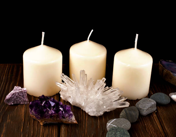 istock Candles with crystals and stones 1248330719