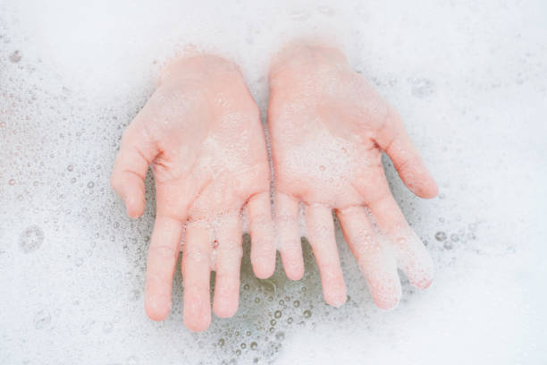 istock Child washing hand in bathroom. 1248337741