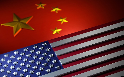 American flag in front of a Chinese flag. Shiny, metallic effect 3D render.
