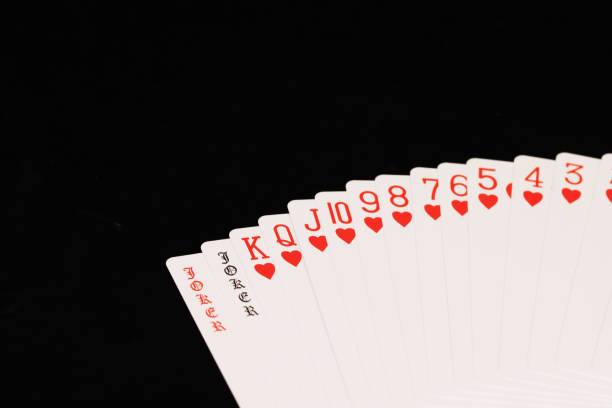 poker card isolated in black background
