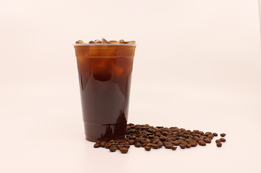 Ice americano in a take-out plastic cup