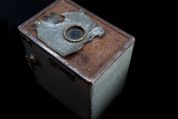 istock Antique, old and vintage camera isolated on black background 1248348450