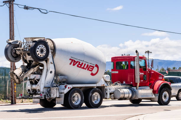 central concrete mixer truck transporting cement to the construction site - truck motion road cement truck imagens e fotografias de stock