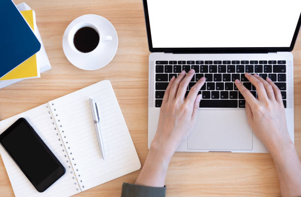 istock Modern young Asian woman working from home with top view. 1248349214