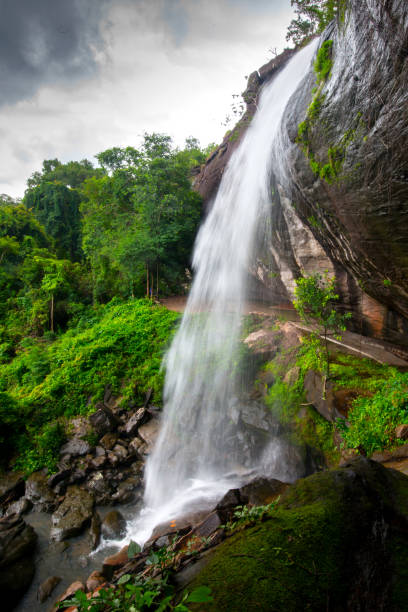 istock Biggest and the most beautiful Pha luang waterfall on rocky cliffs,limestone in Ubonratchathani province,Thailand,Asia. 1248361682
