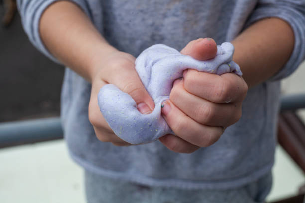 istock Slime in the hands of a child. 1248384465
