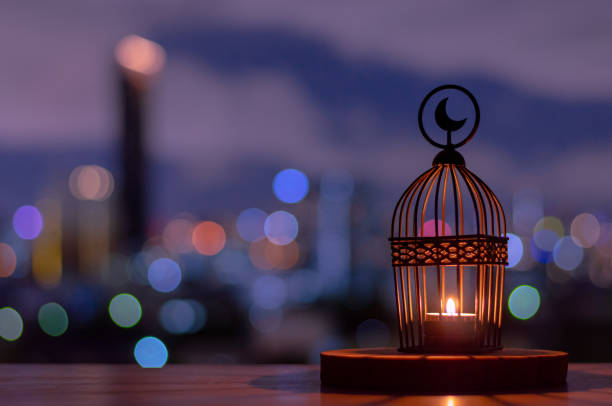 istock Lantern that have moon symbol on top put on wooden tray 1248384506