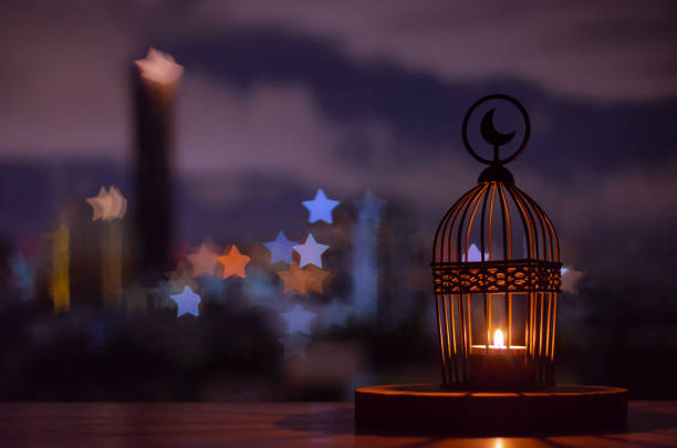 istock Lantern that have moon symbol on top put on wooden tray 1248384511
