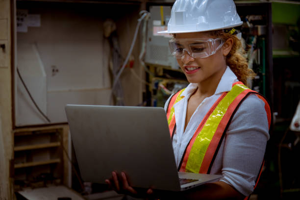 istock Industry engineer under inspection and checking production process on factory station by document on hand ,Engineer wearing casual uniform and safety helmet in work. 1248387320