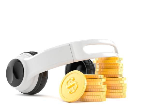 istock Headphones with stack of coins 1248388707