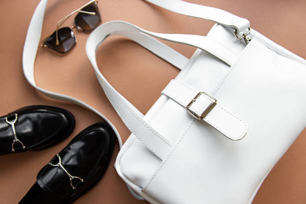 istock White leather bag and shoes loafer. 1248394989