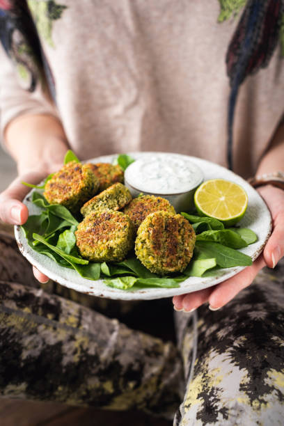 istock Falafel with spinach and greek yogurt sauce 1248396294