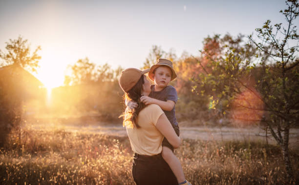 istock Mother and son spending time together in the nature 1248398924