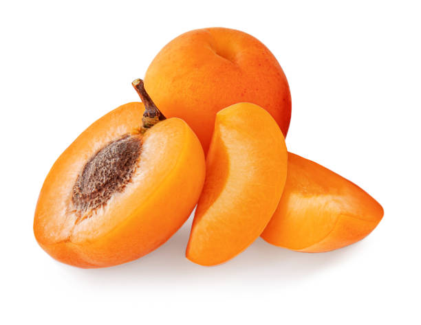 istock Fresh Apricots. Apricot fruit isolated on the white background. 1248401930