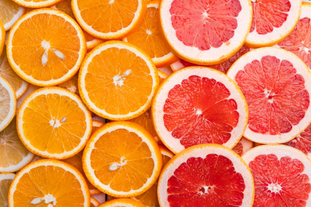 istock Sliced Oranges,Grapefruit,detail on the white background In the studio 1248401965