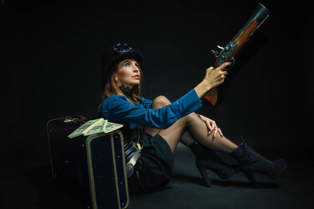 istock Steampunk girl armed and dangerous. 1248411747