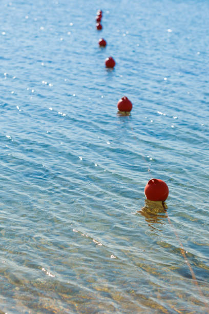 istock Red balls buoys 1248415334