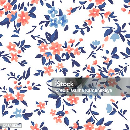 istock Wild flowers background. Simple flat drawing. Floral seamless pattern made of meadow plants and flowers. Summer nature ornament. Modern flat design. Fashion style for textile and fabric. 1248415360