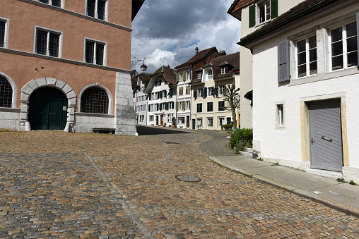 The old City of Solothurn with its historic buildings and paving stone streets. The image was captured during springtime.