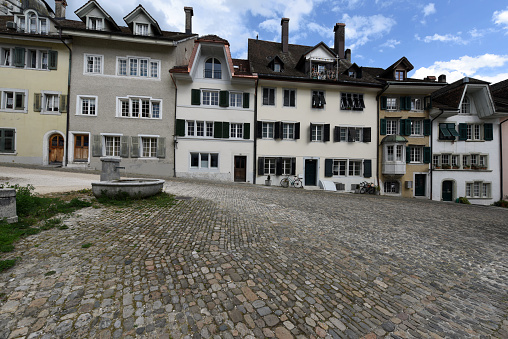 The old City of Solothurn with its historic buildings and paving stone streets. The image was captured during springtime.