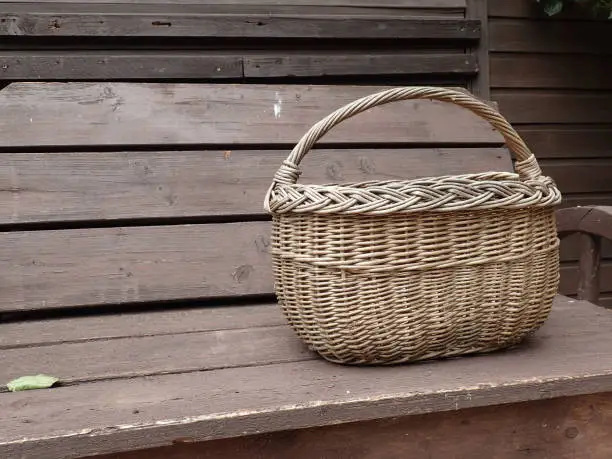 Old basket on the garden bench