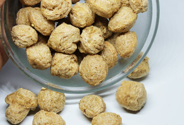 istock Heap of soya chunks isolated on white background 1248423698
