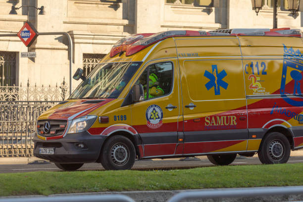Madrid, Spain - May 19, 2020: An Advanced Life Support Unit (USVA), part of the SAMUR-Civil Protection vehicle and ambulance park, as it passes through Calle Alcalá with Cibeles.