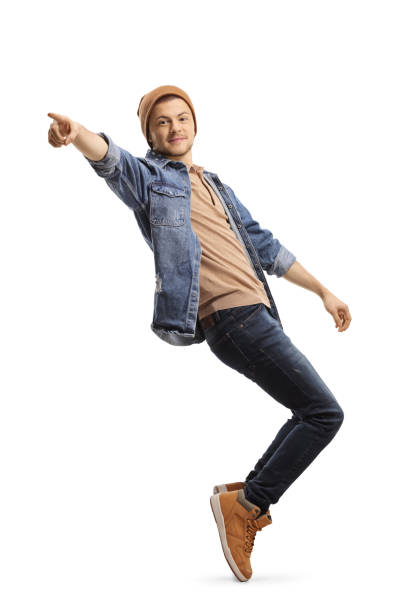 istock Guy in casual wear dancing and pointing 1248431800
