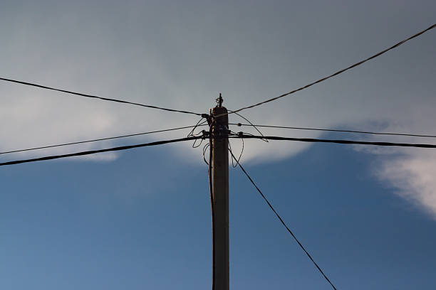 istock pole with wires on a background of the summer sky 1248433112
