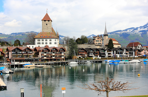 Spiez, Switzerland - March 07, 2020: Visiting Spiez town on a sunny morning in March. Spiez is located on the southern shore of Lake Thun.