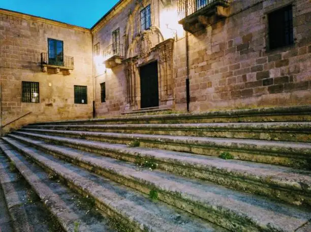 Santa María townsquare stone staircase, low angle view. Lugo city, Galicia, Spain.