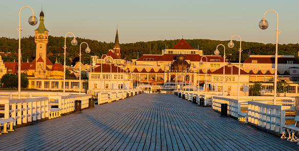 Beautiful sunrise over a wooden pier on the Baltic Sea. Sopot, Poland.