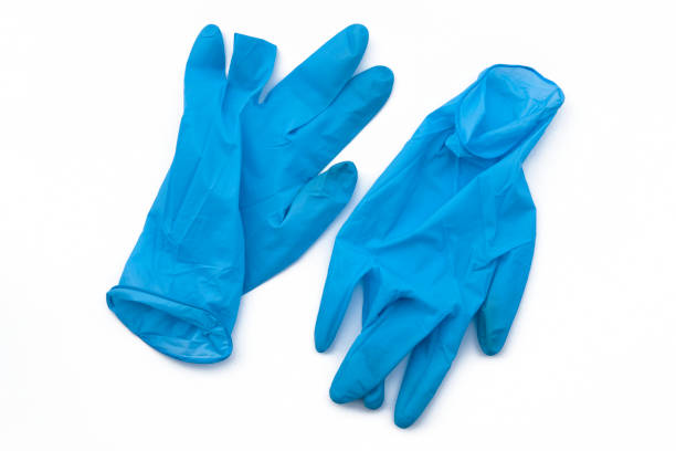 istock Covid-19 disposable contaminated gloves. Coronavirus latex plastic rubbish 1248449478