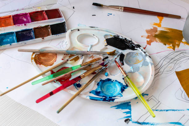 istock Set for drawing on the desktop of a child artist. Selective focus. 1248451857