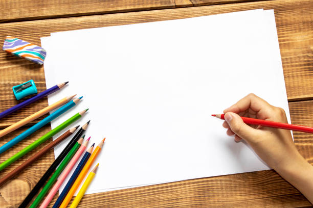 istock The girl draws with colored pencils. Close up. 1248452427