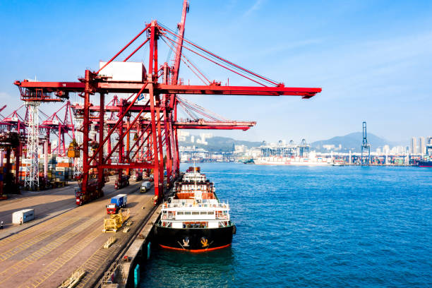 istock Container ship in import export and business logistic in Hong Kong 1248452731