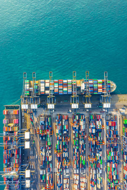 istock Container ship in import export and business logistic in Hong Kong 1248457820